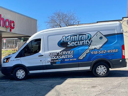 image of the Admiral Security locksmith van outside the showroom
